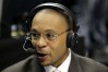 Gus Johnson talks with headphones on