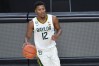 LAS VEGAS, NEVADA - NOVEMBER 28: Jared Butler #12 of the Baylor Bears looks on with the ball against the Louisiana Ragin' Cajuns in the first half of their game during the #VegasBubble basketball tournament at T-Mobile Arena on November 28, 2020 in Las Vegas, Nevada. Baylor won 112-82. 