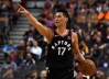 Mar 18, 2019; Toronto, Ontario, CAN; Toronto Raptors guard Jeremy Lin (17) gestures as he directs teammates in the second half against the New York Knicks at Scotiabank Arena. 