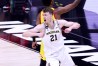 INDIANAPOLIS, INDIANA - MARCH 12: Franz Wagner #21 of the Michigan Wolverines celebrates after making a basket as time expired at the end of the first half in the game against the Maryland Terrapins in the quarterfinals of the Big Ten men's basketball tournament at Lucas Oil Stadium on March 12, 2021 in Indianapolis, Indiana.