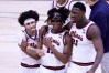 INDIANAPOLIS, INDIANA - MARCH 13: Ayo Dosunmu #11, Kofi Cockburn #21 and Andre Curbelo #5 of the Illinois Fighting Illini walk off the court after a win over the Iowa Hawkeyes in the Big Ten men's basketball tournament semifinals at Lucas Oil Stadium on March 13, 2021 in Indianapolis, Indiana. 