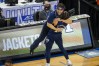 Mar 13, 2021; Greensboro, North Carolina, USA; Georgia Tech Yellow Jackets guard Jose Alvarado (10) hugs Georgia Tech Yellow Jackets head coach Josh Pastner as the Georgia Tech Yellow Jackets defeat the Florida State Seminoles 80-75 to win the 2021 ACC tournament championship at Greensboro Coliseum. 