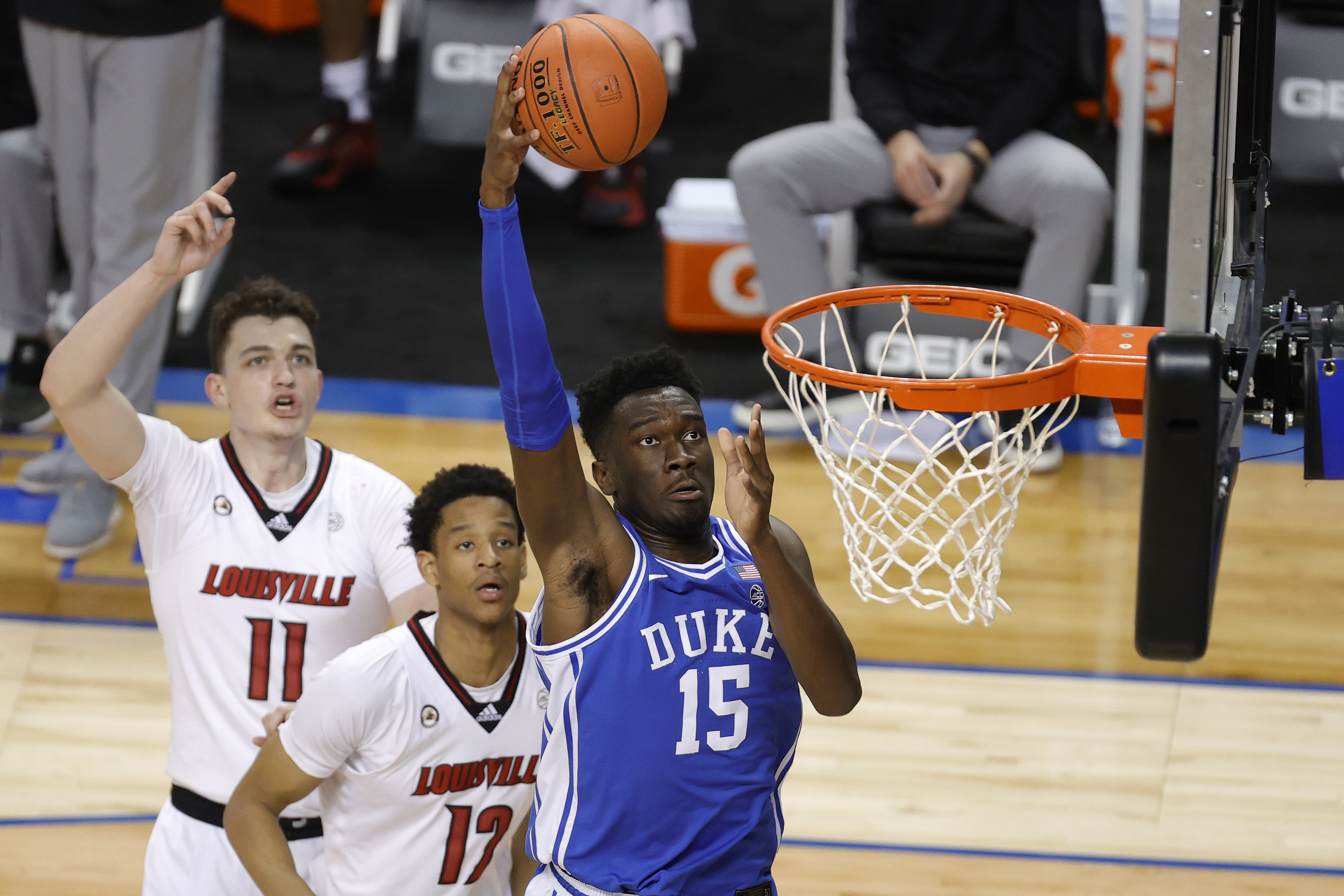 GREENSBORO, NORTH CAROLINA - MARCH 10: Mark Williams #15 of the Duke Blue Devils attempts a lay up during the first half of their second round game against the Louisville Cardinals in the ACC Men's Basketball Tournament at Greensboro Coliseum on March 10, 2021 in Greensboro, North Carolina.