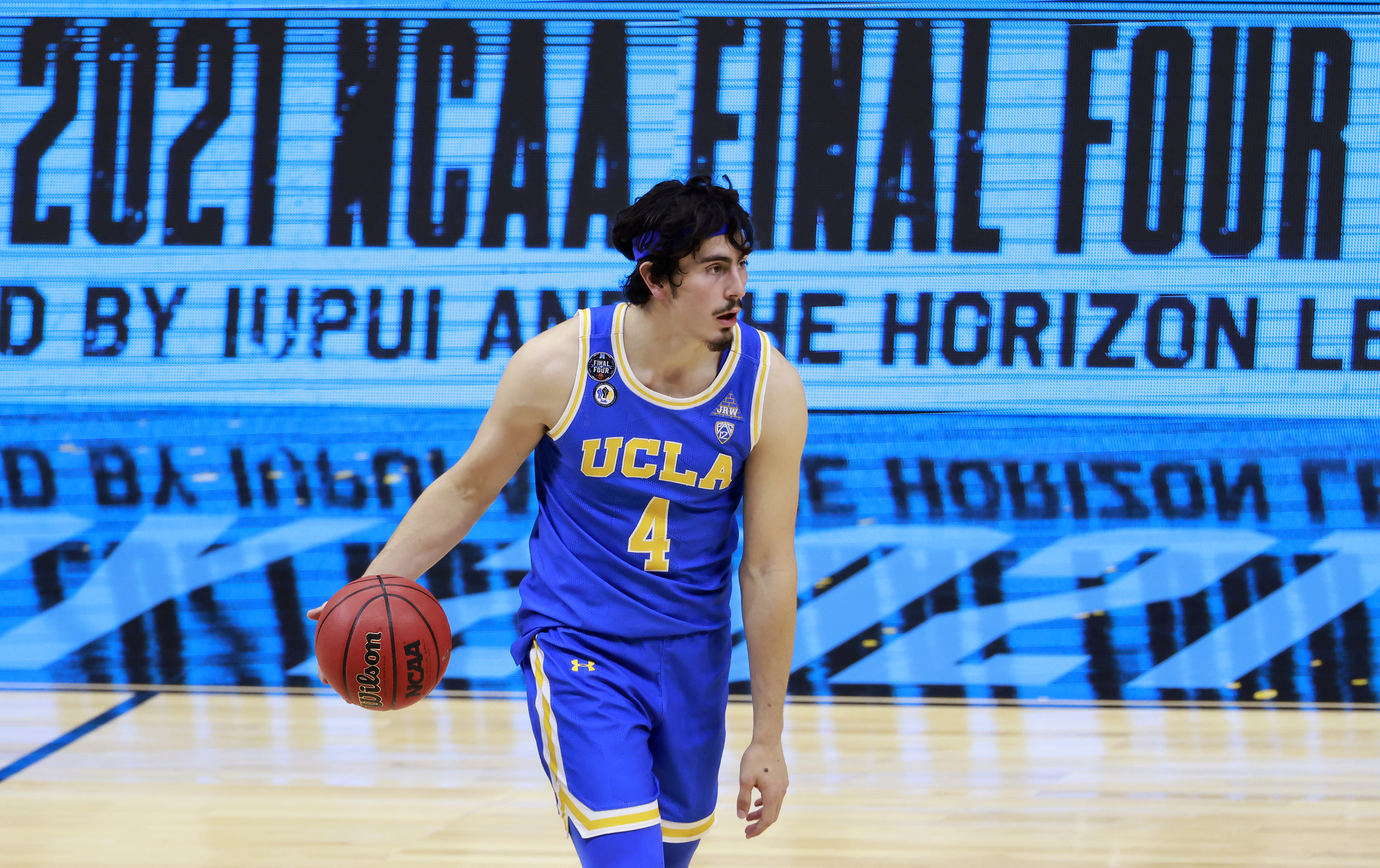 INDIANAPOLIS, INDIANA - APRIL 03: Jaime Jaquez Jr. #4 of the UCLA Bruins dribbles in overtime against the Gonzaga Bulldogs during the 2021 NCAA Final Four semifinal at Lucas Oil Stadium on April 03, 2021 in Indianapolis, Indiana.