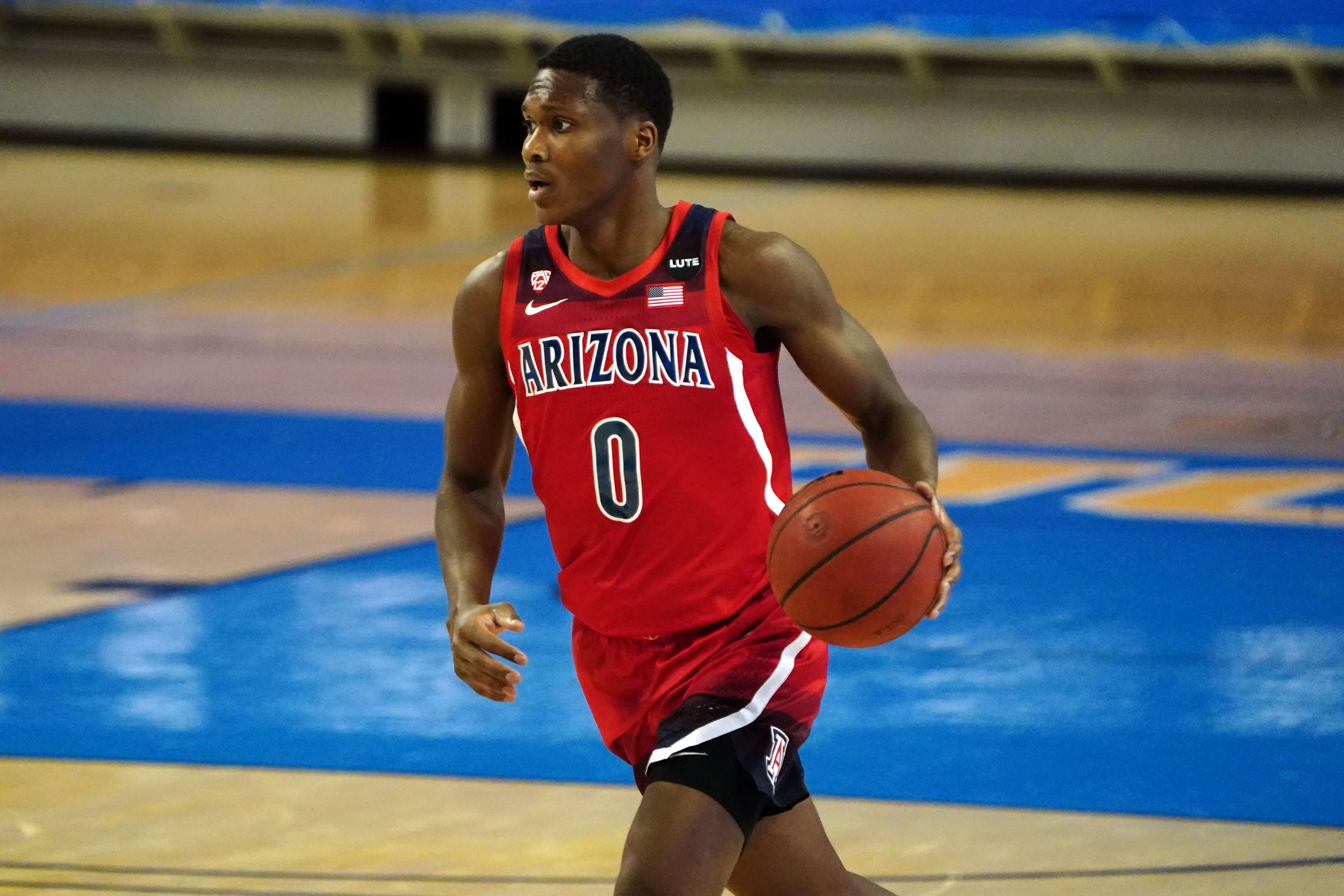 Feb 18, 2021; Los Angeles, California, USA; Arizona Wildcats guard Bennedict Mathurin (0) dribbles the ball against the UCLA Bruins in the first half at Pauley Pavilion. UCLA defeated Arizona 74-60. 