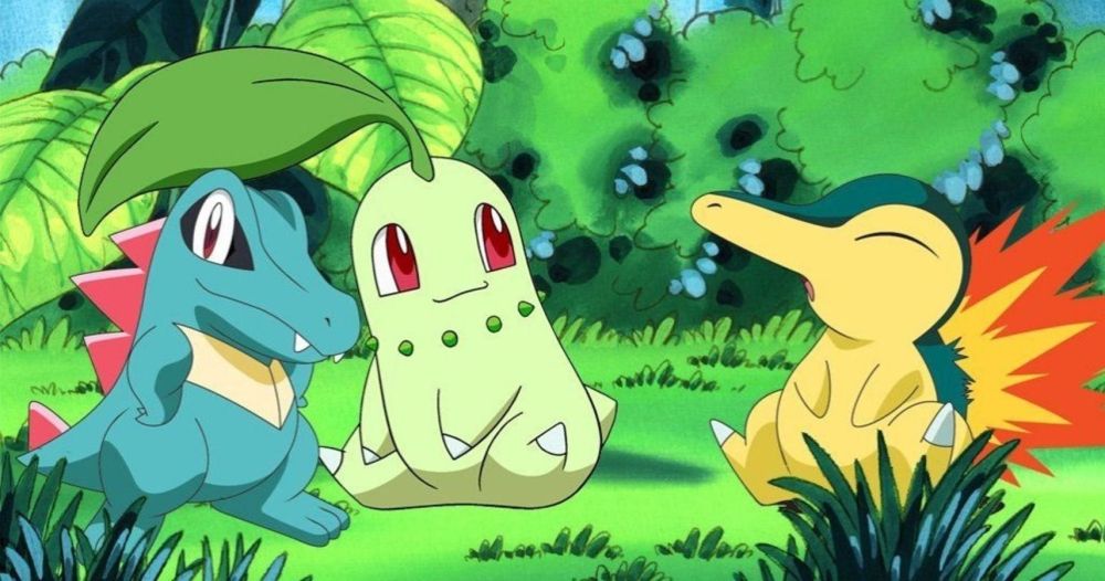 Totodile, Chikorita, and Cyndaquil sitting next to each other in Pokémon