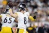 Kenny Pickett throws a pass from the pocket in a preseason Steelers game.