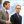 Joe Buck and Troy Aikman walking on a field together
