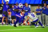 Sep 8, 2022; Inglewood, California, USA; Buffalo Bills defensive end Boogie Basham (55) rush the ball after an interception in the fourth quarter against the Los Angeles Rams at SoFi Stadium.
