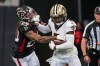 Sep 11, 2022; Atlanta, Georgia, USA; New Orleans Saints wide receiver Jarvis Landry (5) runs against Atlanta Falcons cornerback Mike Ford (28) during the first half at Mercedes-Benz Stadium.