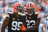 Sep 11, 2022; Charlotte, North Carolina, USA; Cleveland Browns defensive end Myles Garrett (95) reacts with cornerback Martin Emerson Jr. (23) in the third quarter at Bank of America Stadium.
