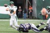 Sep 11, 2022; East Rutherford, New Jersey, USA; New York Jets quarterback Joe Flacco (19) is tackled by Baltimore Ravens defensive tackle Broderick Washington (96) while throwing the ball during the second half at MetLife Stadium.