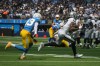 Sep 11, 2022; Inglewood, California, USA; Las Vegas Raiders wide receiver Davante Adams (17) is pursued by Los Angeles Chargers cornerback Michael Davis (43) in the first half at SoFi Stadium.