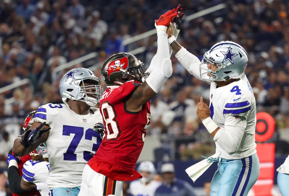 Dak Prescott breaks his hand as Shaq Barrett crashes into him.