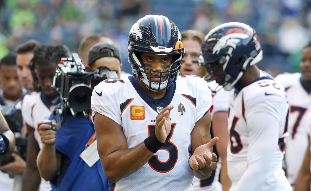 Sep 12, 2022; Seattle, Washington, USA; Denver Broncos quarterback Russell Wilson (3) applauds following pregame warmups against the Seattle Seahawks at Lumen Field.