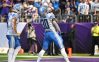 Sep 25, 2022; Minneapolis, Minnesota, USA; Detroit Lions wide receiver Amon-Ra St. Brown (14) and running back Jamaal Williams (30) react after a touchdown by Williams against the Minnesota Vikings during the first quarter at U.S. Bank Stadium.
