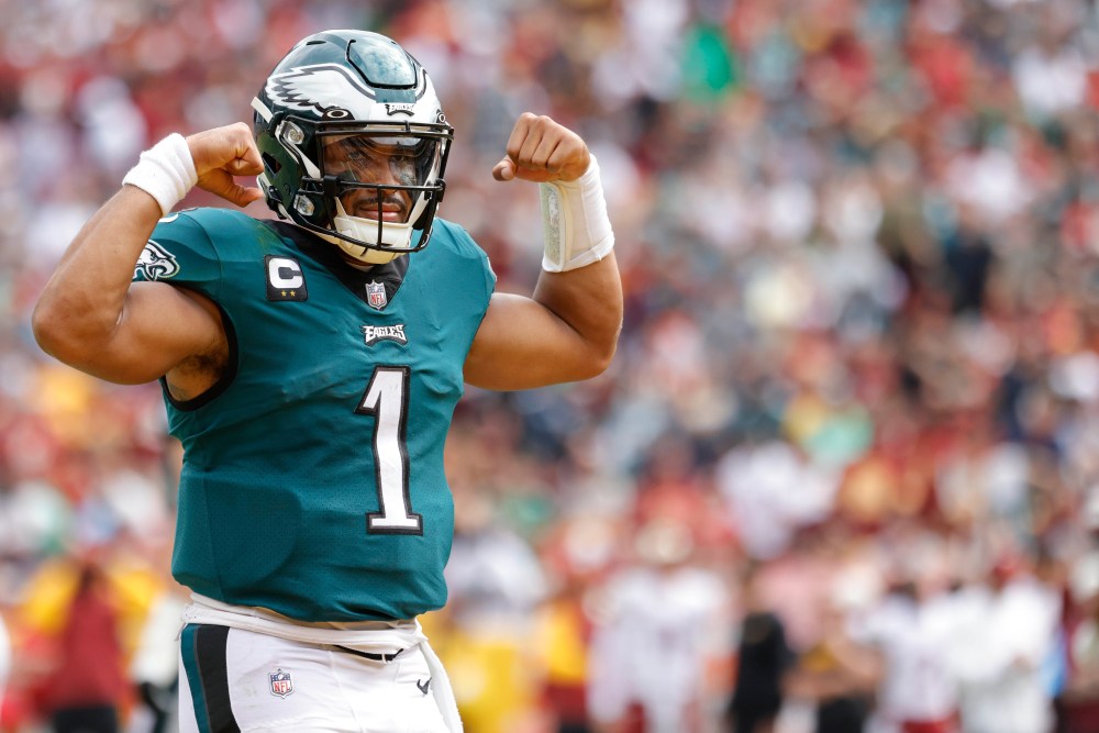 Sep 25, 2022; Landover, Maryland, USA; Philadelphia Eagles quarterback Jalen Hurts (1) celebrates after throwing a touchdown pass against the Washington Commanders during the second quarter at FedExField.