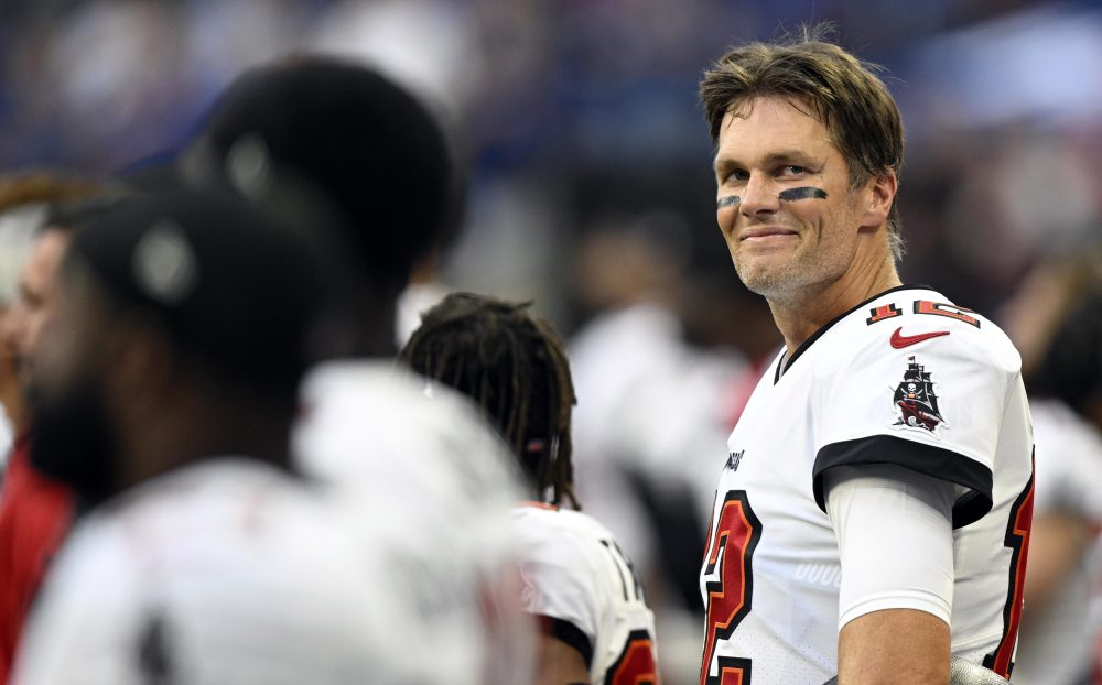 Aug 27, 2022; Indianapolis, Indiana, USA; Tampa Bay Buccaneers quarterback Tom Brady (12) smiles during the national anthem before the game against the Indianapolis Colts at Lucas Oil Stadium.