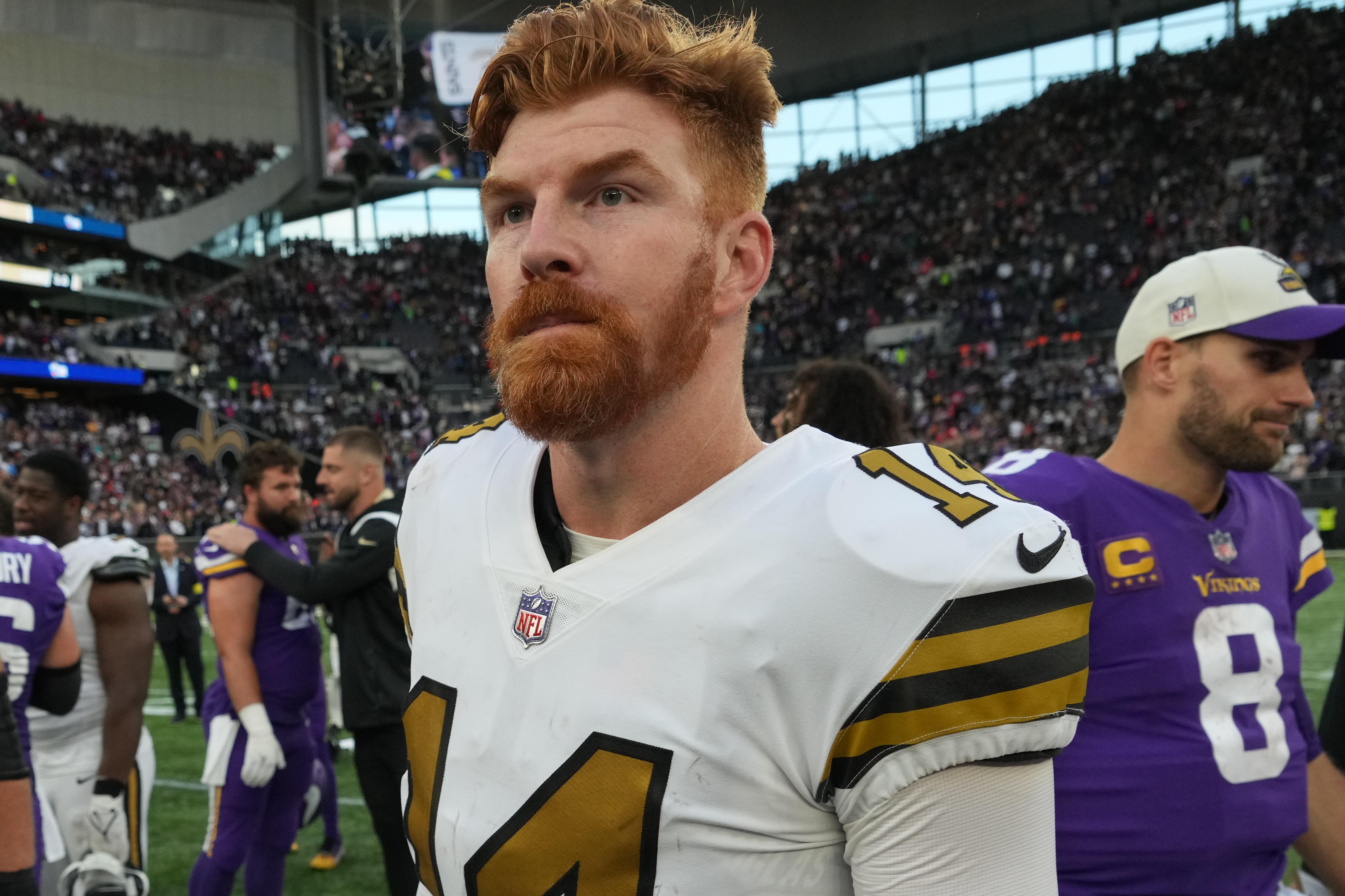Oct 2, 2022; London, United Kingdom; New Orleans Saints quarterback Andy Dalton (14) walks off the field after an NFL International Series game against the Minnesota Vikings at Tottenham Hotspur Stadium. The Vikings defeated the Saints 28-25. 