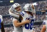Oct 2, 2022; Arlington, Texas, USA; Dallas Cowboys quarterback Cooper Rush (10) and wide receiver CeeDee Lamb (88) celebrates a touchdown against the Washington Commanders in the fourth quarter