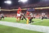 Oct 2, 2022; Tampa, Florida, USA; Kansas City Chiefs quarterback Patrick Mahomes (15) throws the ball in for a touchdown against the Tampa Bay Buccaneers during the first half at Raymond James Stadium.