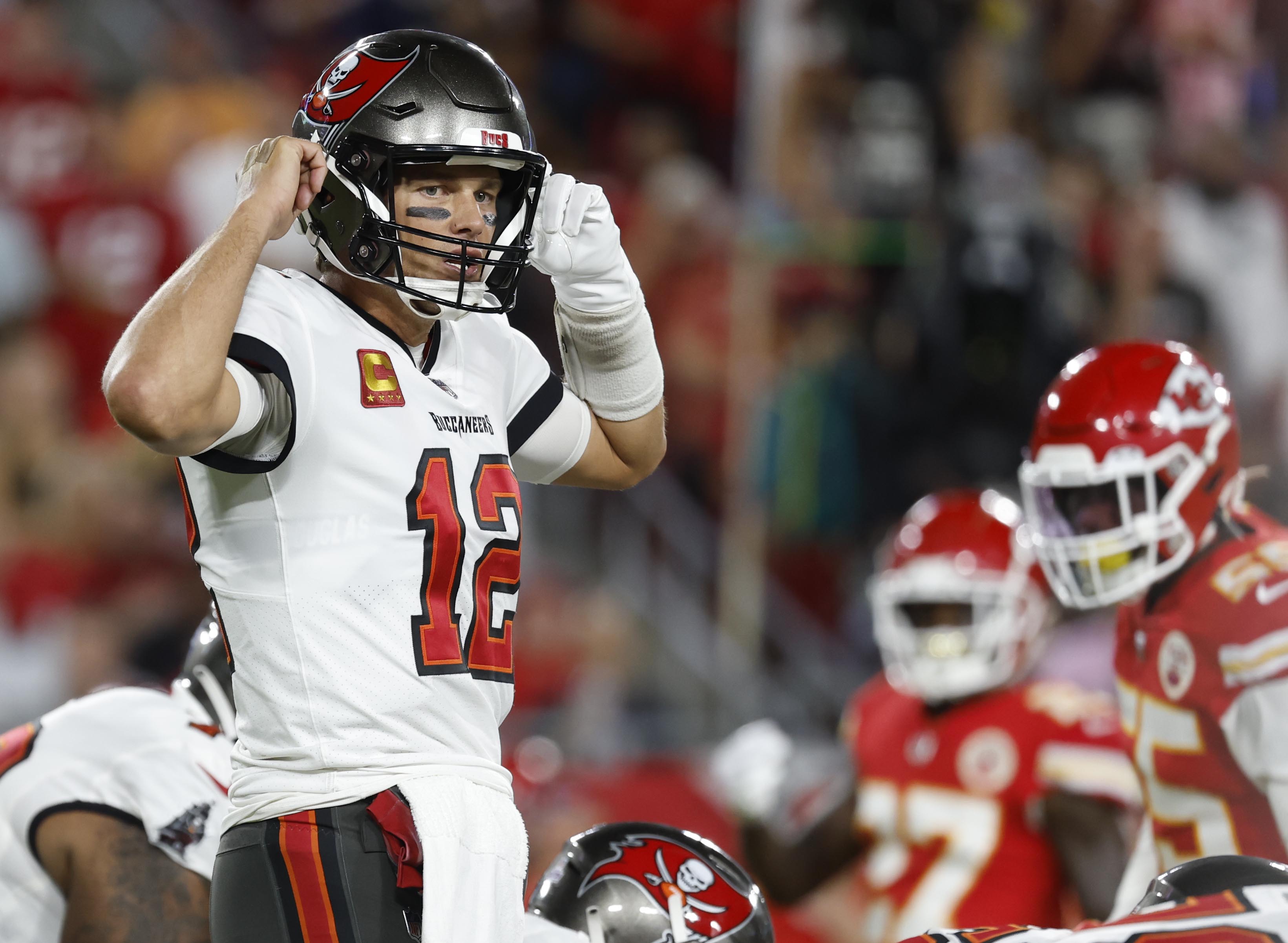 Oct 2, 2022; Tampa, Florida, USA;Tampa Bay Buccaneers quarterback Tom Brady (12) calls a play against the Kansas City Chiefs during the first half at Raymond James Stadium.