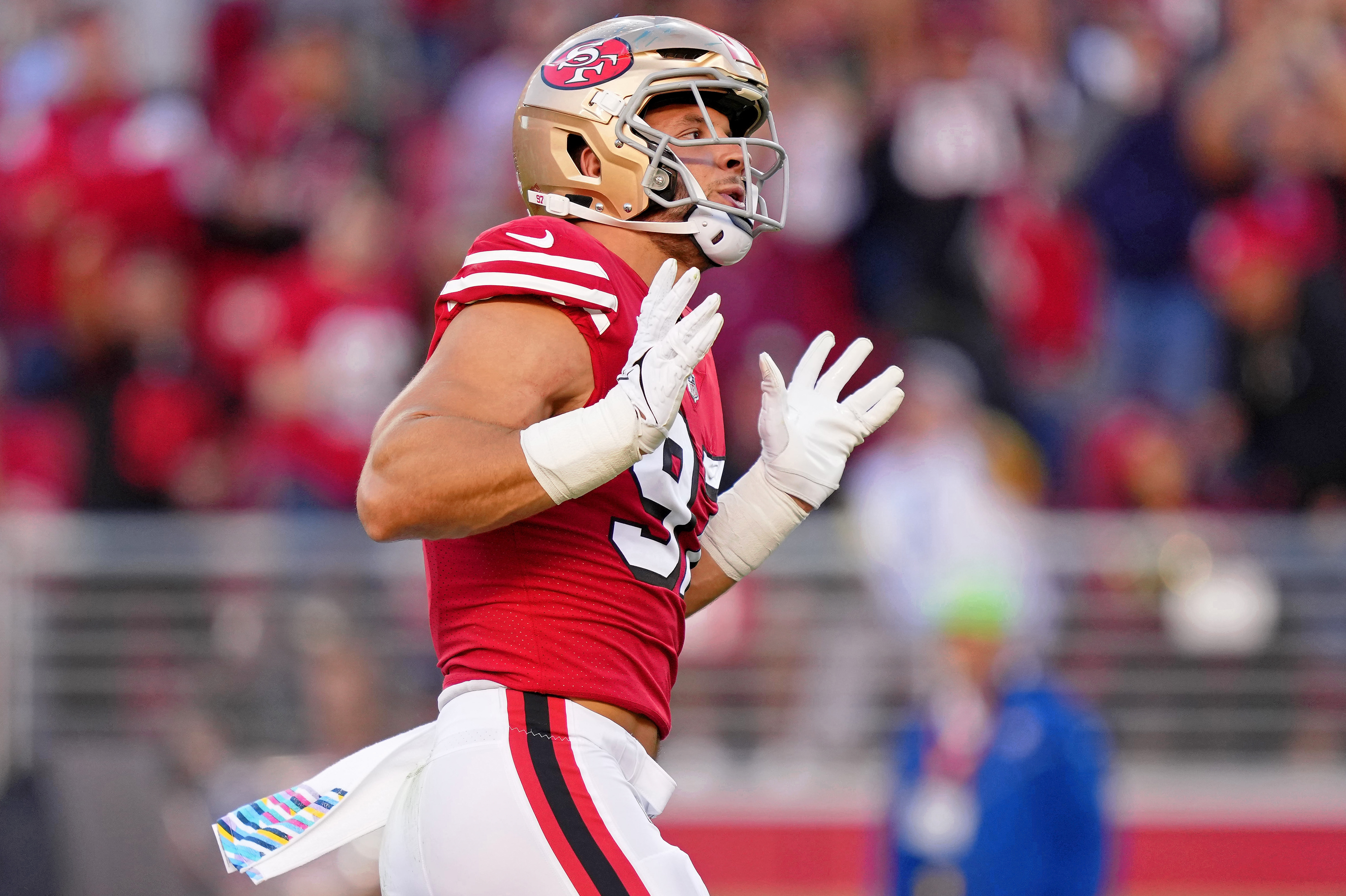 Oct 3, 2022; Santa Clara, California, USA; San Francisco 49ers defensive end Nick Bosa (97) reacts after making a sack against the Los Angeles Rams during the first quarter at Levi's Stadium.