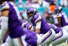 Oct 16, 2022; Miami Gardens, Florida, USA; Minnesota Vikings quarterback Kirk Cousins (8) receives the snap against the Miami Dolphins during the first quarter at Hard Rock Stadium. 