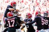 Oct 16, 2022; Atlanta, Georgia, USA; Atlanta Falcons players including quarterback Marcus Mariota (1) react with tight end Kyle Pitts (8) after his touchdown catch against the San Francisco 49ers during the second half at Mercedes-Benz Stadium.