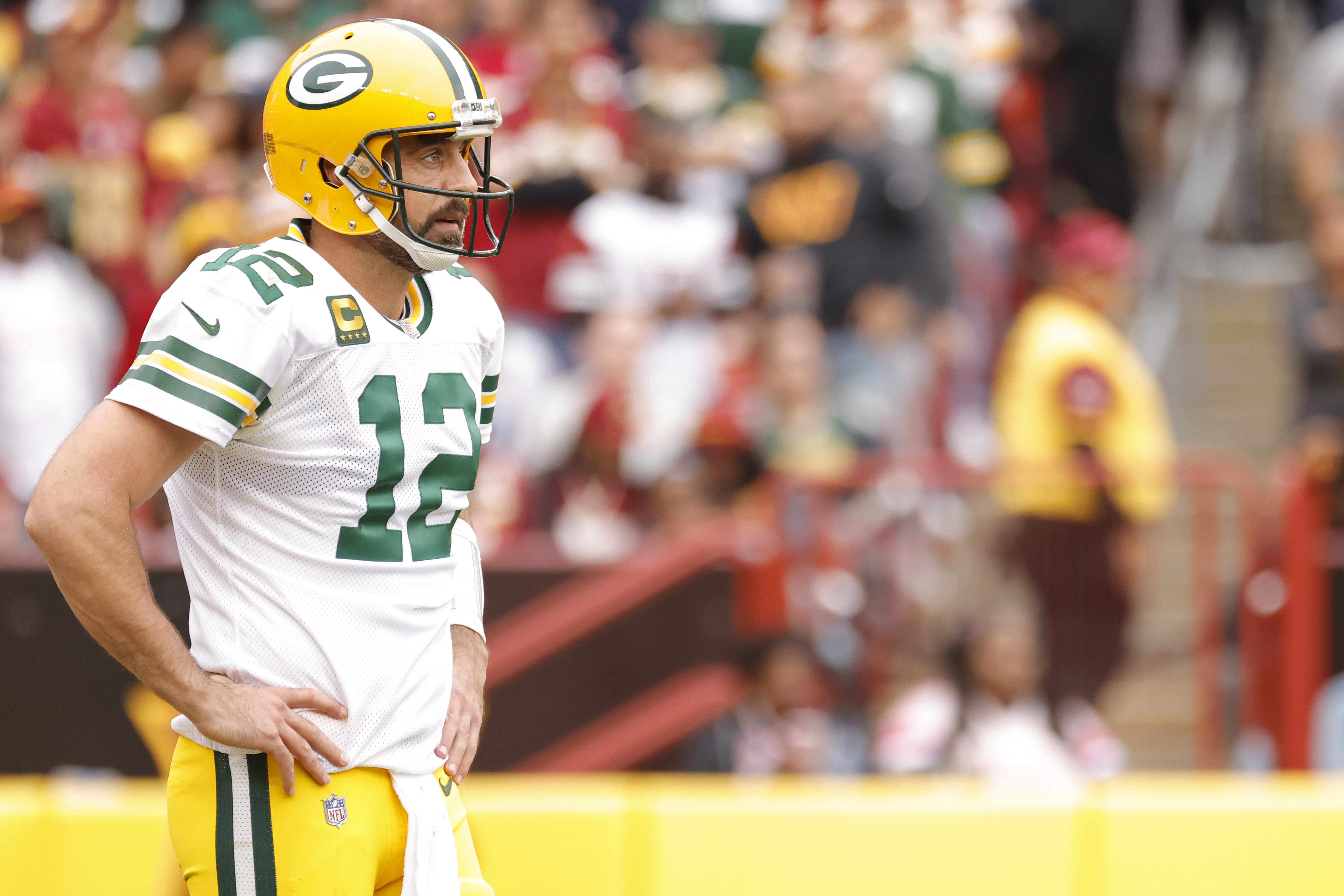 Oct 23, 2022; Landover, Maryland, USA; Green Bay Packers quarterback Aaron Rodgers (12) reacts after an incomplete pass against the Washington Commanders during the second quarter at FedExField.