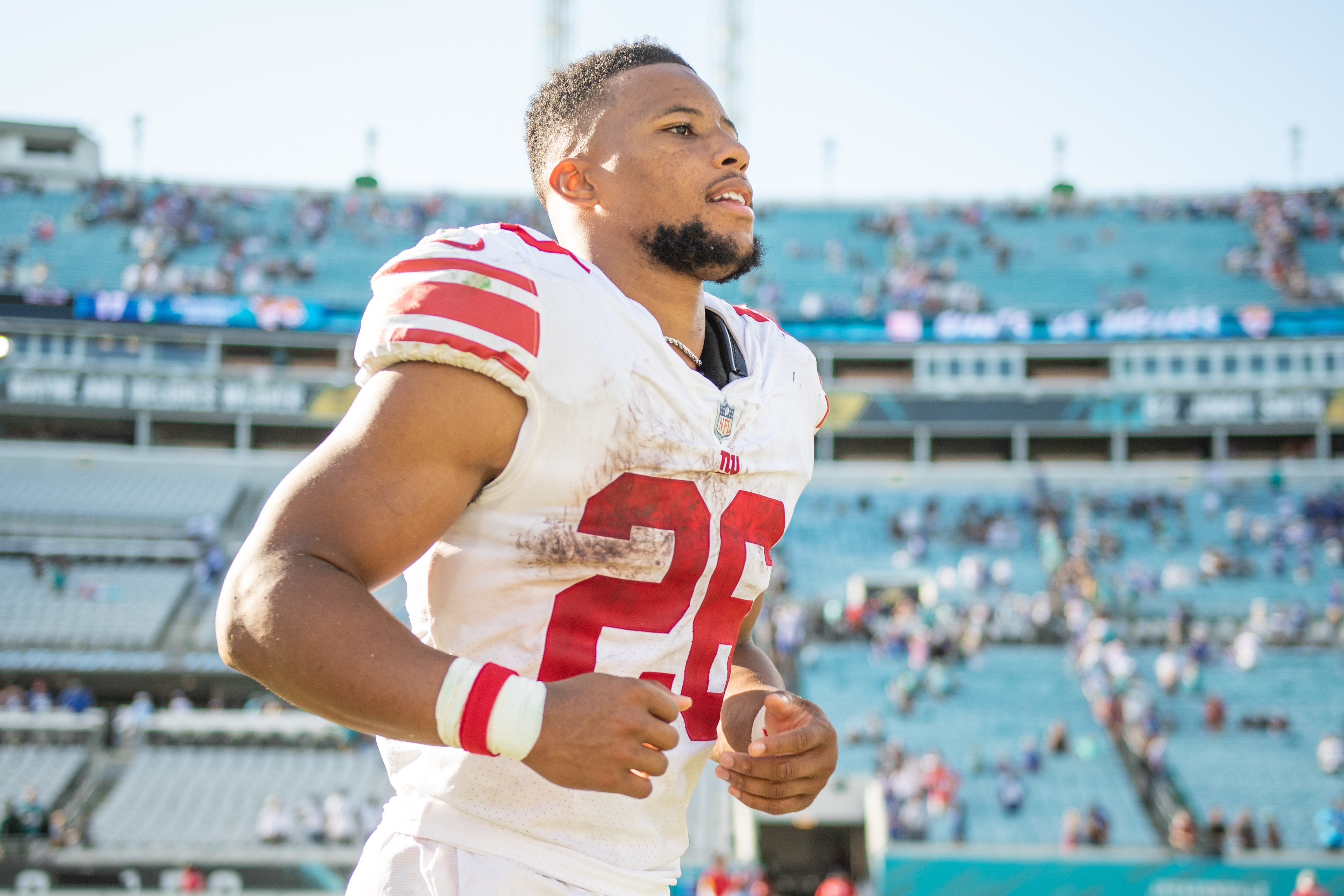 Oct 23, 2022; Jacksonville, Florida, USA; New York Giants running back Saquon Barkley (26) runs off the field after the game against the Jacksonville Jaguars at TIAA Bank Field. 