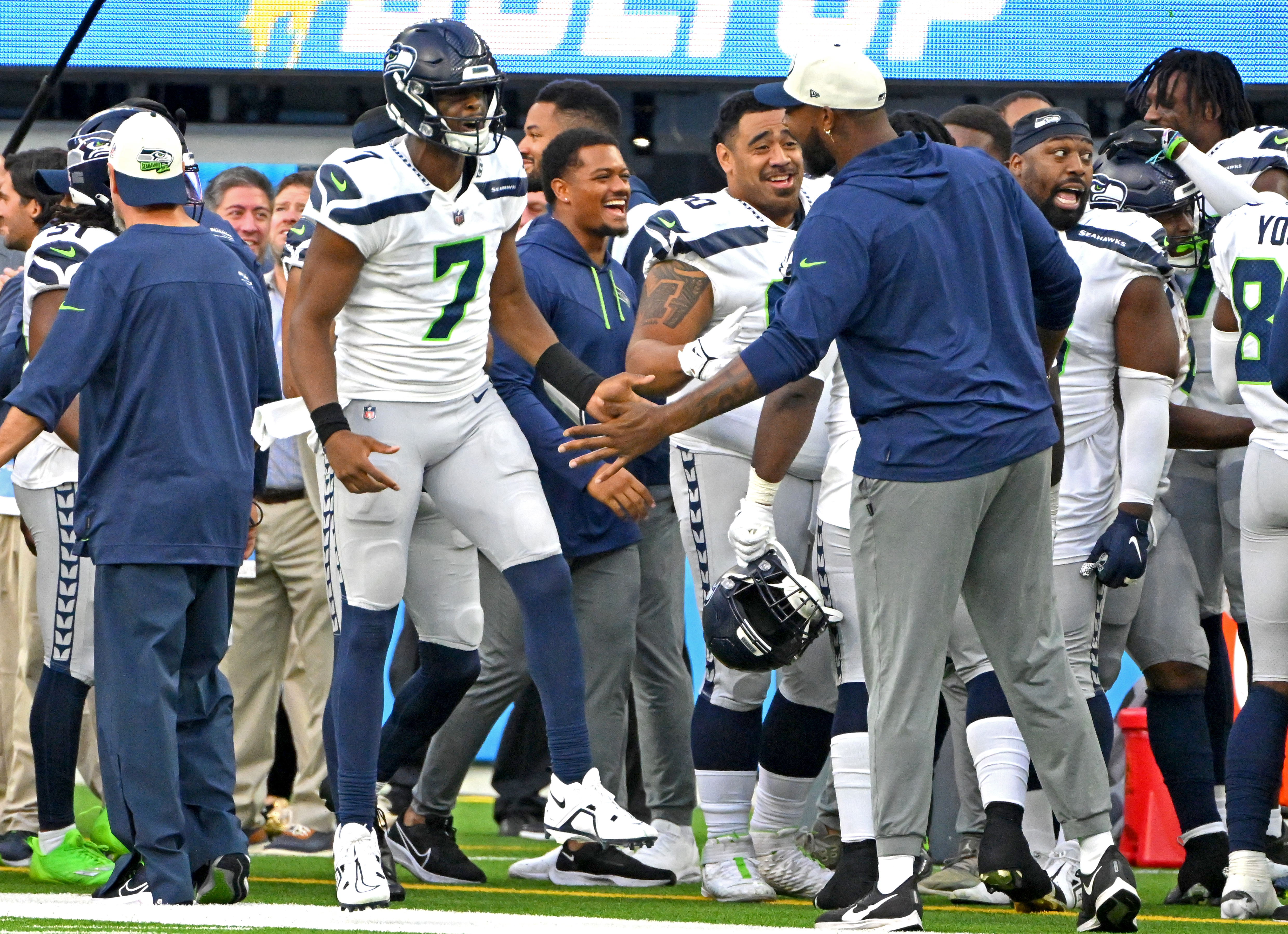 Oct 23, 2022; Inglewood, California, USA; Seattle Seahawks quarterback Geno Smith (7) celebrates after a touchdown in the fourth quarter against the Los Angeles Chargers at SoFi Stadium. 