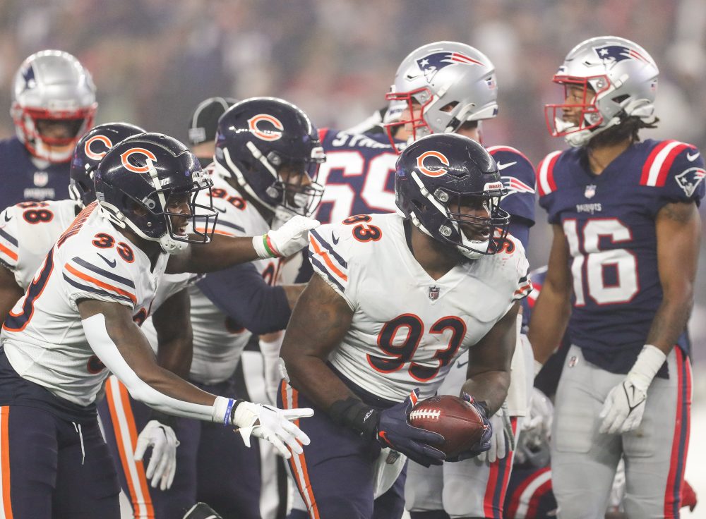 Oct 24, 2022; Foxborough, Massachusetts, USA; Chicago Bears defensive tackle Justin Jones (93) recovers a fumble during the first half against the New England Patriots at Gillette Stadium.