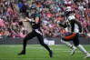Oct 30, 2022; London, United Kingdom; Jacksonville Jaguars quarterback Trevor Lawrence (16) throws the ball in the first half against under pressure from Denver Broncos defensive end Dre'Mont Jones (93) during an NFL International Series game at Wembley Stadium. 