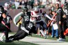 Oct 30, 2022; East Rutherford, New Jersey, USA; New England Patriots safety Devin McCourty (32) is forced out of bounds by New York Jets quarterback Zach Wilson (2) after an interception during the fourth quarter at MetLife Stadium. 