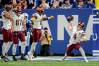 Washington Commanders quarterback Taylor Heinicke (4) spikes the ball after a game-tying touchdown Sunday, Oct. 30, 2022, during a game against the Indianapolis Colts at Indianapolis Colts at Lucas Oil Stadium in Indianapolis.