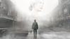Silent Hill 2 and other announcements from the Silent Hill stream: A woman's face appears above a fog bank that covers an abandoned main street