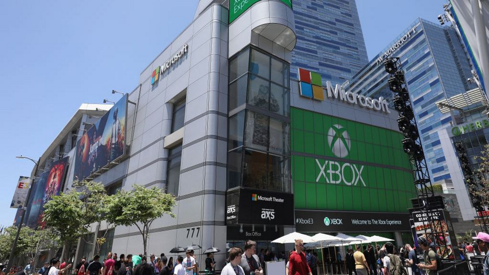 Microsoft says regulators sided with Sony on ActiBlizz acquisition: The word Xbox appears on a green billboard on the side of a large glass building