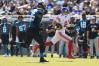 New York Giants quarterback Daniel Jones (8) rushes for yards against Jacksonville Jaguars defensive end Roy Robertson-Harris (95) during the fourth quarter of a regular season NFL football matchup Sunday, Oct. 23, 2022 at TIAA Bank Field in Jacksonville. The New York Giants defeated the Jacksonville Jaguars 23-17. 