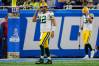 Green Bay Packers quarterback Aaron Rodgers (12) walks off the field after a pass was intercepted by the Detroit Lions during the first half at Ford Field, Nov. 6, 2022.