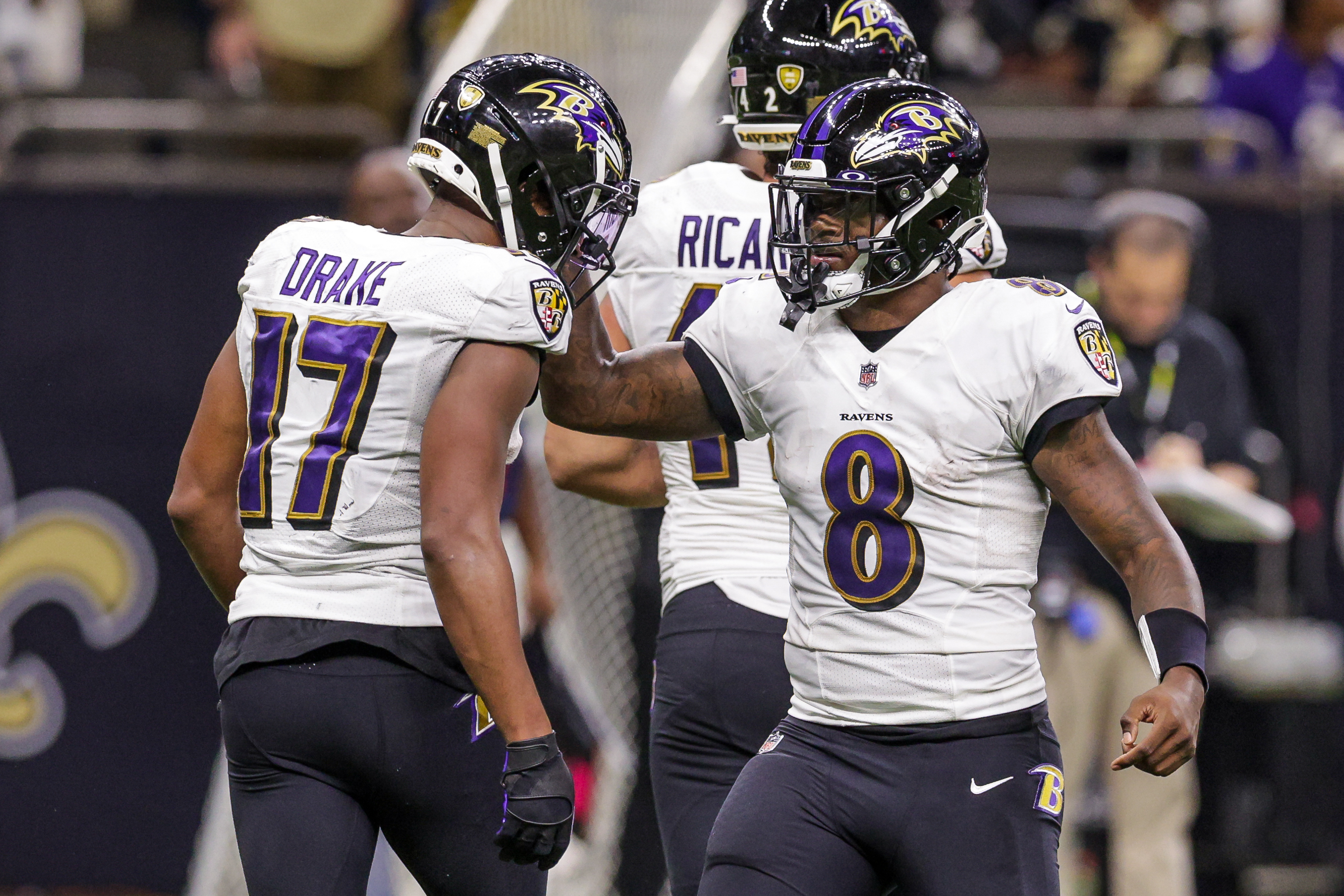 Nov 7, 2022; New Orleans, Louisiana, USA; Baltimore Ravens quarterback Lamar Jackson (8) congratulates running back Kenyan Drake (17) on scoring a touchdown against the New Orleans Saints during the second half at Caesars Superdome