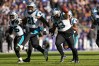 Nov 20, 2022; Baltimore, Maryland, USA; Carolina Panthers defensive tackle Bravvion Roy (93) runs with teammates after making an interception against the Baltimore Ravens during the first half at M&T Bank Stadium. 
