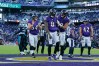 Nov 20, 2022; Baltimore, Maryland, USA; Baltimore Ravens quarterback Lamar Jackson (8) celebrates with tight end Mark Andrews (89) after running for a touchdown against the Carolina Panthers during the second half at M&T Bank Stadium. 