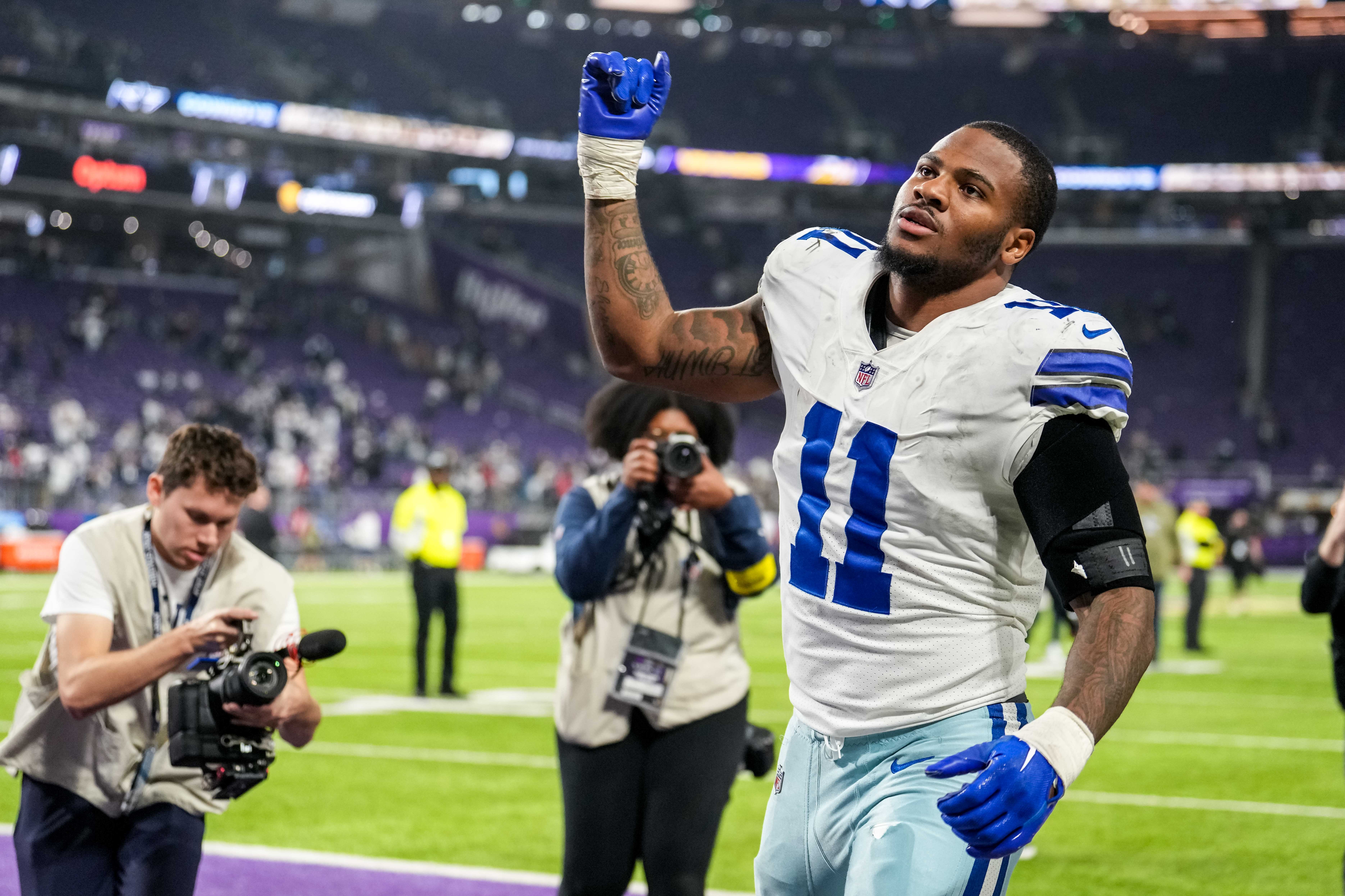 Nov 20, 2022; Minneapolis, Minnesota, USA; Dallas Cowboys linebacker Micah Parsons (11) looks on following the game against the Minnesota Vikings at U.S. Bank Stadium. 