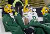 Green Bay Packers wide receiver Christian Watson (9) sits on the bench late in the fourth quarter against the Tennessee Titans during their football game Thursday, November 17, at Lambeau Field in Green Bay, Wis.
