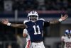 Nov 24, 2022; Arlington, Texas, USA; Dallas Cowboys linebacker Micah Parsons (11) celebrates after he sacks New York Giants quarterback Daniel Jones (8) during the second half of the game between the Cowboys and the Giants at AT&T Stadium.