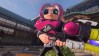 The first Splatoon 3 DLC adds new maps, weapons, and more: An animated child with octopus hair holds a water gun and stares straight ahead