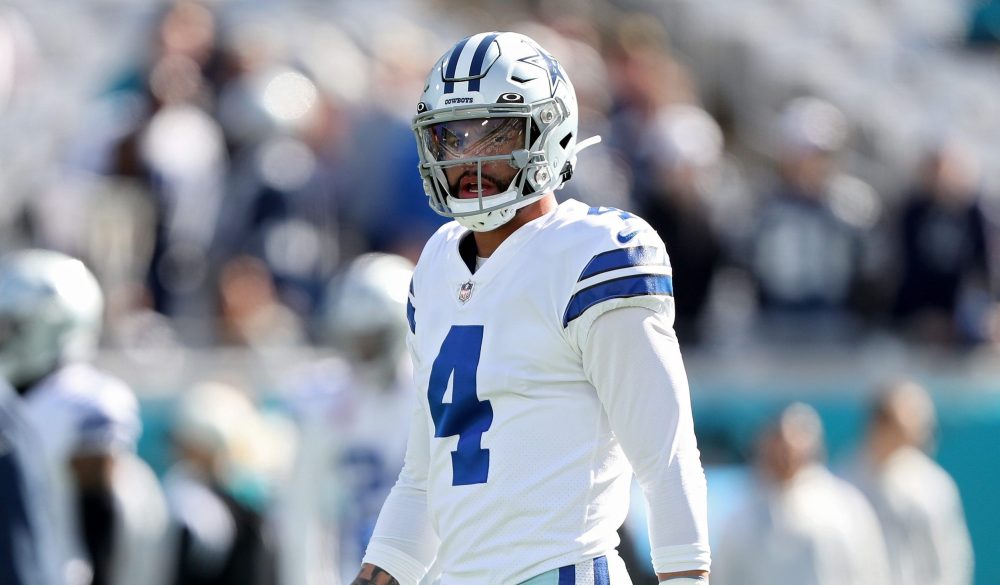 JACKSONVILLE, FLORIDA - DECEMBER 18: Dak Prescott #4 of the Dallas Cowboys looks on during the first half of the game against the Jacksonville Jaguars at TIAA Bank Field on December 18, 2022 in Jacksonville, Florida.