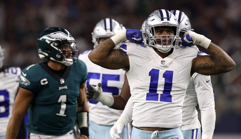 ARLINGTON, TEXAS - SEPTEMBER 27: Micah Parsons #11 of the Dallas Cowboys celebrates a sack of Jalen Hurts #1 of the Philadelphia Eagles at AT&T Stadium on September 27, 2021 in Arlington, Texas.