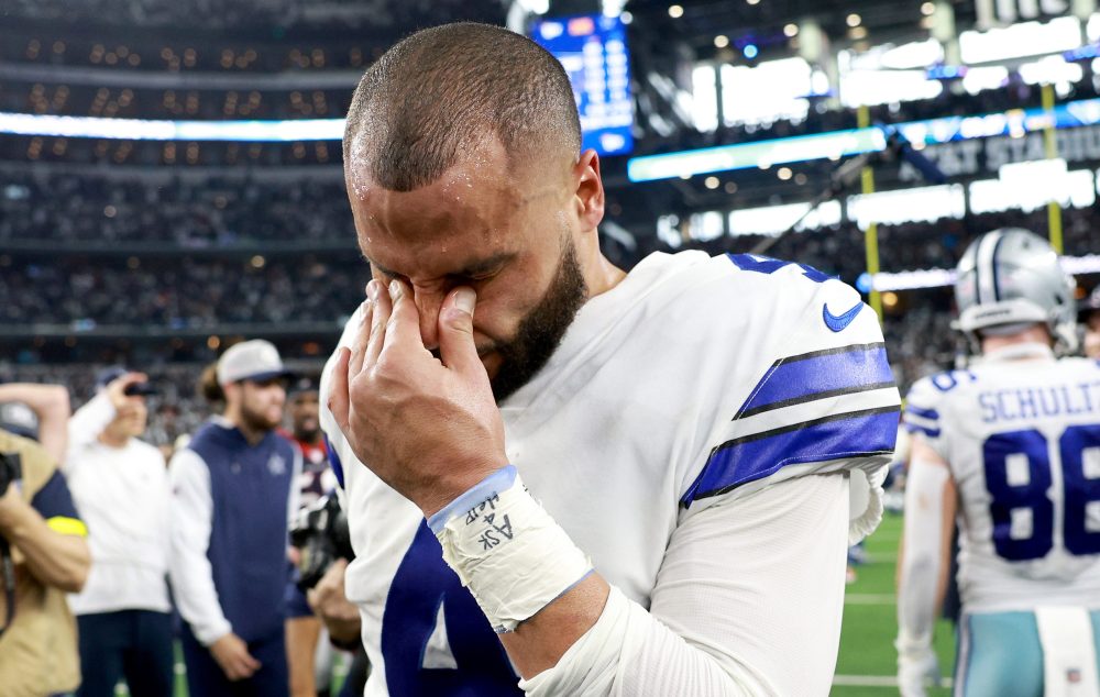ARLINGTON, TEXAS - DECEMBER 11: Dak Prescott #4 of the Dallas Cowboys reacts after a game against the Houston Texans at AT&T Stadium on December 11, 2022 in Arlington, Texas.